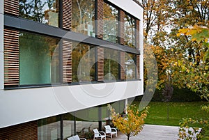 Beautiful modern residential building with huge glass windows.