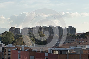 Beautiful modern residential buildings in golden hour afternoon with bloudy blue sky