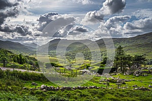 Beautiful Molls Gap with Owenreagh River valley, MacGillycuddys Reeks mountains and sheep farms