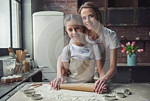 Mom and daughter baking