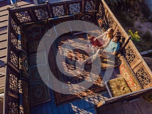 Beautiful morning in Cappadocia - a young couple on the Turkish terrace