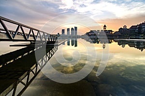 beautiful morning at lakeside. building reflection on the lake