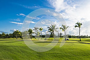 Beautiful morning panorama golf course at sunrise, blue sky