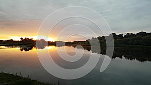 Beautiful morning river landscape at dawn, zoom out timelapse.