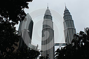 A beautiful morning sun glints off the Petronas Twin Towers and the Suria KLCC.