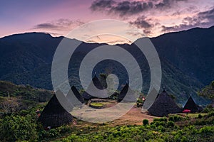 Beautiful morning sunrise over Wae Rebo ancient village in a jungle, Labuan island, Flores island in Indonesia photo