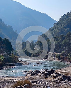 Beautiful morning view of the Sunkoshi river with the scenic view of the hills on the background. Beautiful hill river in Nepal
