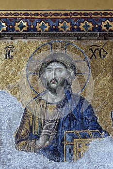 A beautiful mosaic of Jesus Christ on a wall inside Aya Sofya in the Sultanahmet district of Istanbul in Turkey.