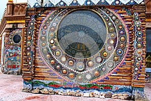 Beautiful mosaic mandalas on the walls of the main building at wat Prathat, Pha Sorn Kaew, in Khao Kor, Phetchabun, Thailand.