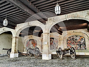 Beautiful mosaics and canons at L'ancien Arsenal Geneva. photo