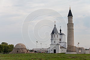 Beautiful mosque and church against the blue sky