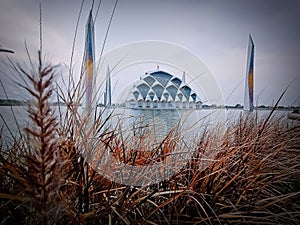 beautiful mosque in the middle of the lake Indonesia