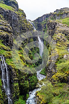 Beautiful mossy canyon at Glymur Waterfall in Iceland