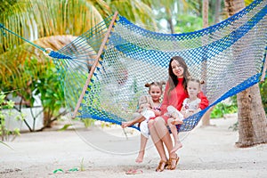 Beautiful mother and daughters on Caribbean beach