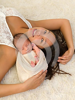 Beautiful mother with newborn baby