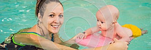Beautiful mother teaching cute baby girl how to swim in a swimming pool. Child having fun in water with mom BANNER, LONG
