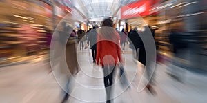 Beautiful motion blur of people walking in the morning rush hour, busy modern life concept.