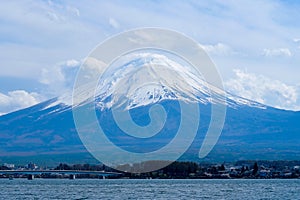 Beautiful Mount Fuji with snow capped and blue sky at Lake kawaguchiko, Japan. landmark and popular for attractions