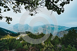 Beautiful mountain and forest landscape on a cloudy day. Top view
