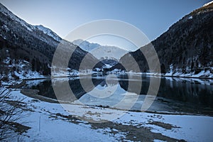 Beautiful mountain lake of artouste in sunrise dawn, pyrenees, france