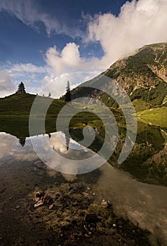 Beautiful mountain lake with clear water from Obersdorf in Bavaria, Germany