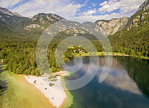 Beautiful Mountain Lake Landscape Against Cloudy Sky At Summer.