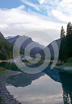 Beautiful mountain lake and landscape in the Swiss Alps near Arosa in late autumn with fall colors