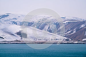 Beautiful mountain and lake scene in the West Tianshan Mountains in winter