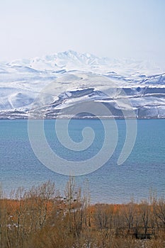 Beautiful mountain and lake scene in the West Tianshan Mountains in winter