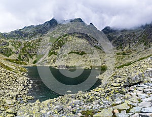 Beautiful mountain lake under the Rysy mountain photo