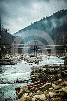 Beautiful mountain landscape with lake and bridges