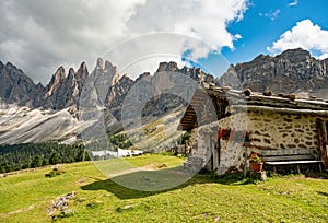 Beautiful mountain landscape of rifugio Brogles in Dolomites Italy photo