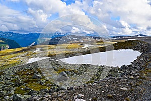 The beautiful mountain landscape. Snow road Aurlandsvegen. Norway