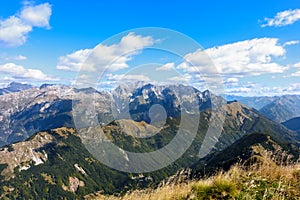 Beautiful mountain panorama on Italian Alps with blue sky and cl