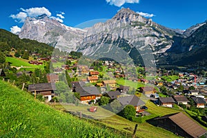 Beautiful mountain resort view with high mountains in background, Grindelwald
