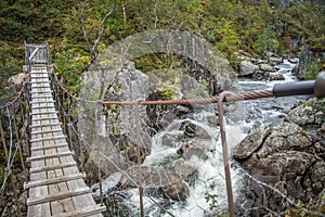 A beautiful mountain river rapids in mountains of Folgefonna National park in Norway.