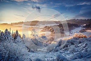 Beautiful mountain snowy landscape. Sunset landscape.