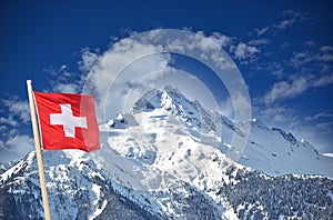 Beautiful mountain with Swiss flag