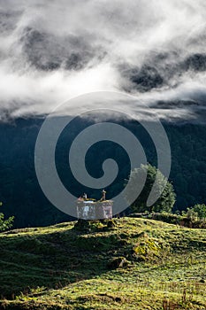 A beautiful mountain view with fog and clouds