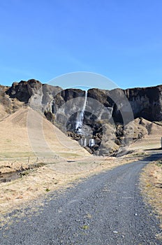 Beautiful mountain with a waterfall in Reykjavik Iceland