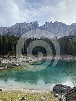 Beautiful Mountains with a blue lake Karersee in north Italy