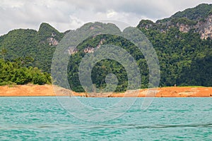 Beautiful mountains lake and natural attractions in Ratchaprapha Dam at Khao Sok National Park