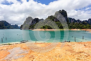 Beautiful mountains lake river sky and natural attractions in Ratchaprapha Dam at Khao Sok National Park