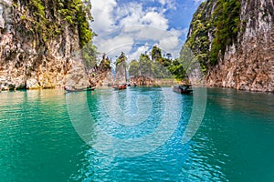 Beautiful mountains lake river sky and natural attractions in Ratchaprapha Dam at Khao Sok National Park