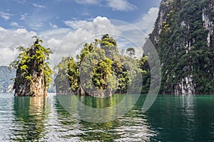 Beautiful mountains lake river sky and natural attractions in Ratchaprapha Dam at Khao Sok National Park