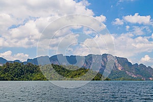 Beautiful mountains lake river sky and natural attractions in Ratchaprapha Dam at Khao Sok National Park, Surat Thani Province, Th