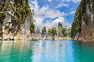 Beautiful mountains lake river sky and natural attractions in Ratchaprapha Dam at Khao Sok National Park, Thailand