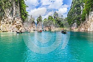 Beautiful mountains lake river sky and natural attractions in Ratchaprapha Dam at Khao Sok National Park, Thailand