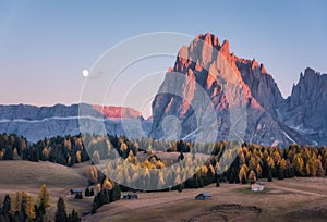 Beautiful mountains with lighted peaks at sunset in autumn