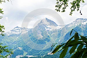 Beautiful mountains with snow on top in summer. Tourism, travel, landscape
